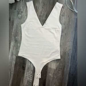 White bodysuits top dynamite